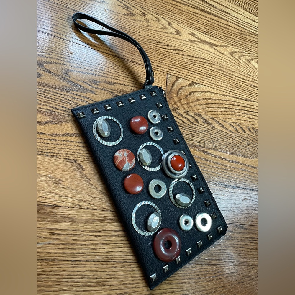 Chic Black Wristlet with Red and Silver Embellishments